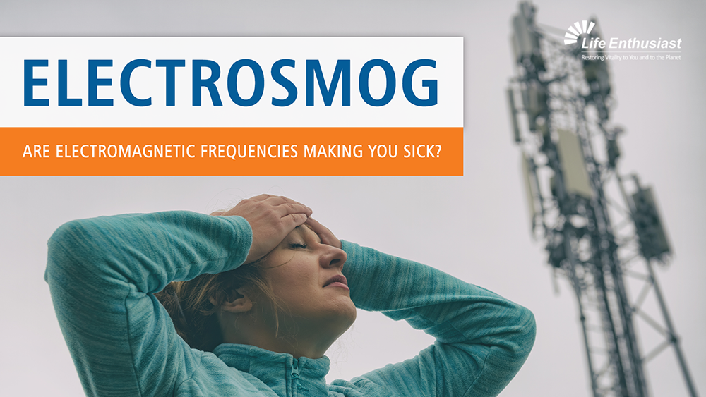 Women facing up with eyes closed putting both hands on her forehead with cell phone tower blurred in the background