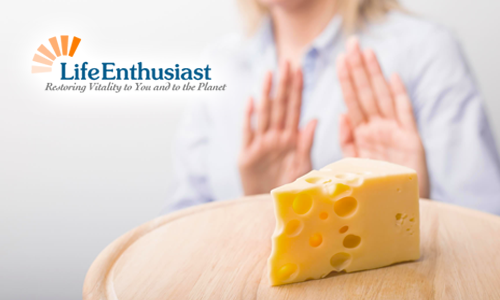 blog, womans hands pushing away a block of cheese