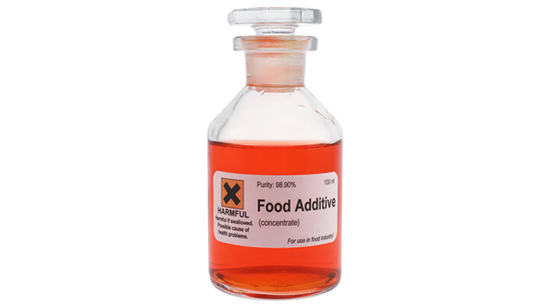 vial with label Harmful Food Additive concentrate