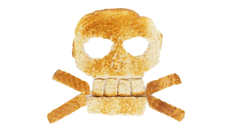 bread toasted and cut in shape of skull and crossbones