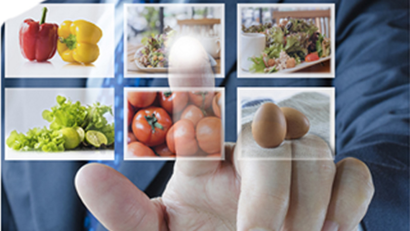 fingers choosing between images of healthy foods