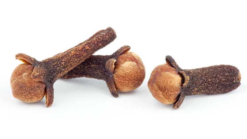 close up of 3 whole Cloves