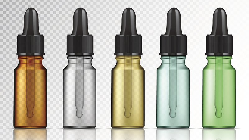 five assorted colored dropper bottles