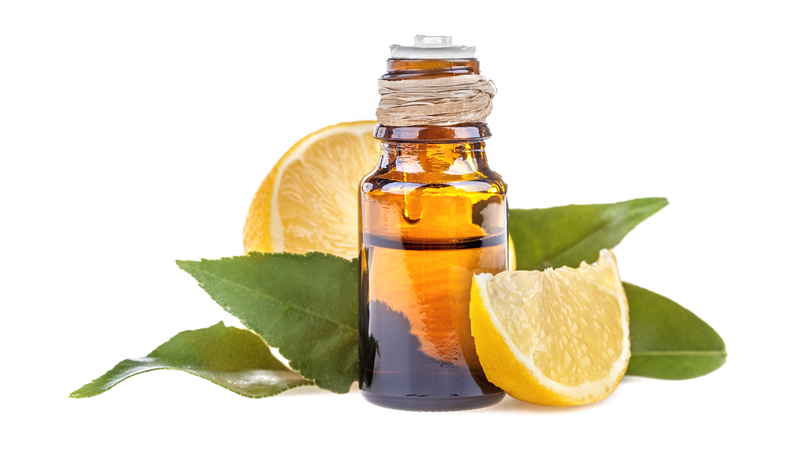 tincture bottle with lemon and greens