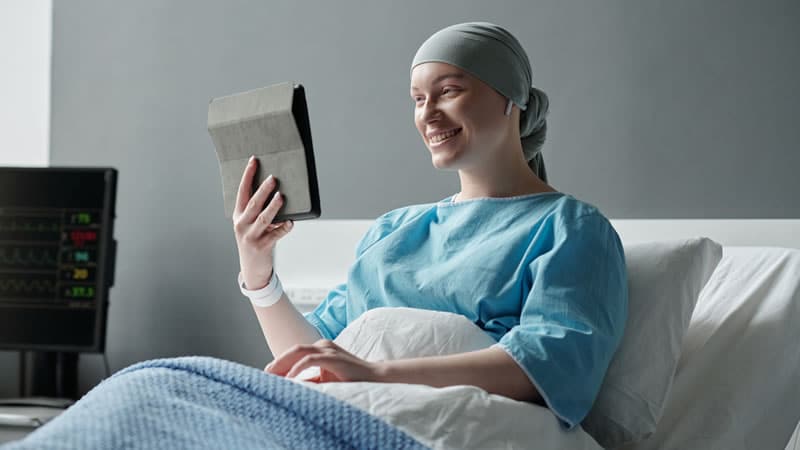Woman with Cancer reading a book