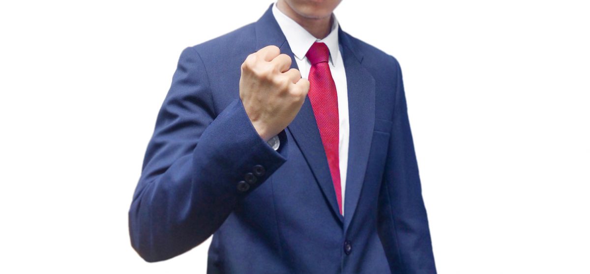 Man in a Suit with a clenched Fist