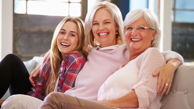 3 generations of smiling healthy women