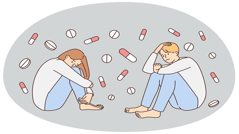 pills surrounding two people