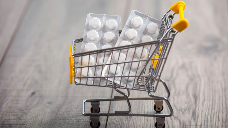 miniature shopping cart with sealed tablets