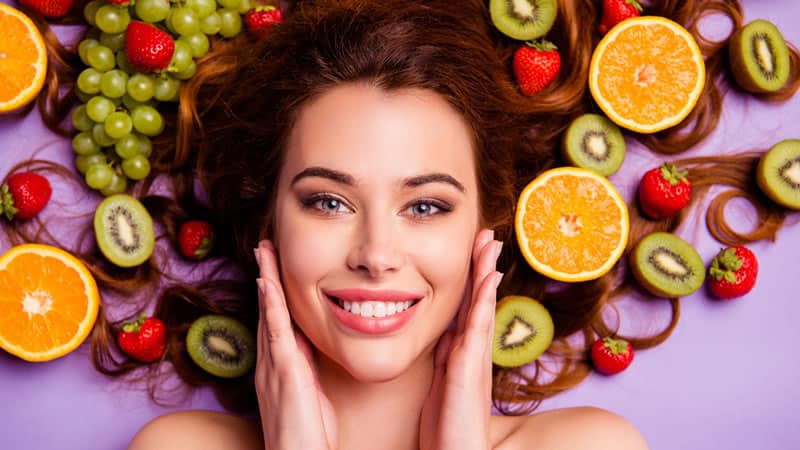 Woman's Face and Fruit Nutrition