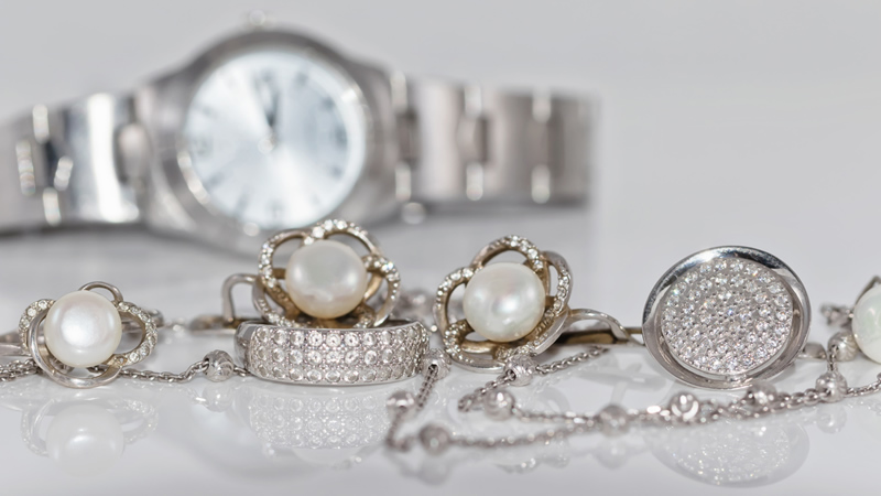 old silver costume jewelry and watch