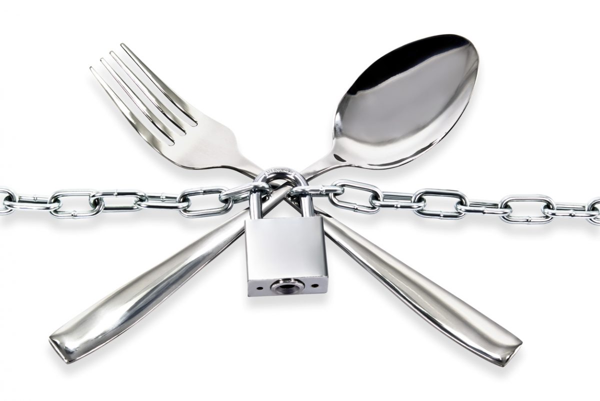 Fork and Spoon locked up with a chain